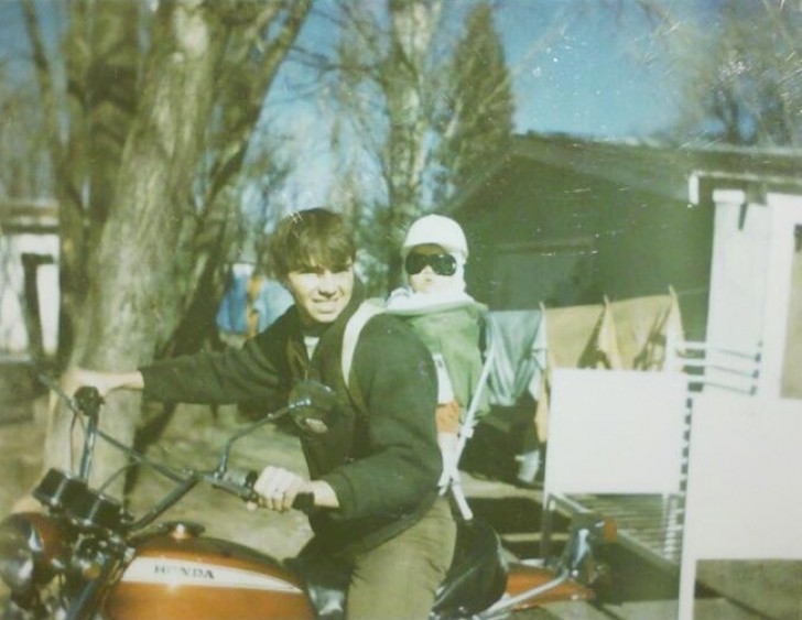 My grandpa with my mother riding in his backpack ... ready to roll! (1971)