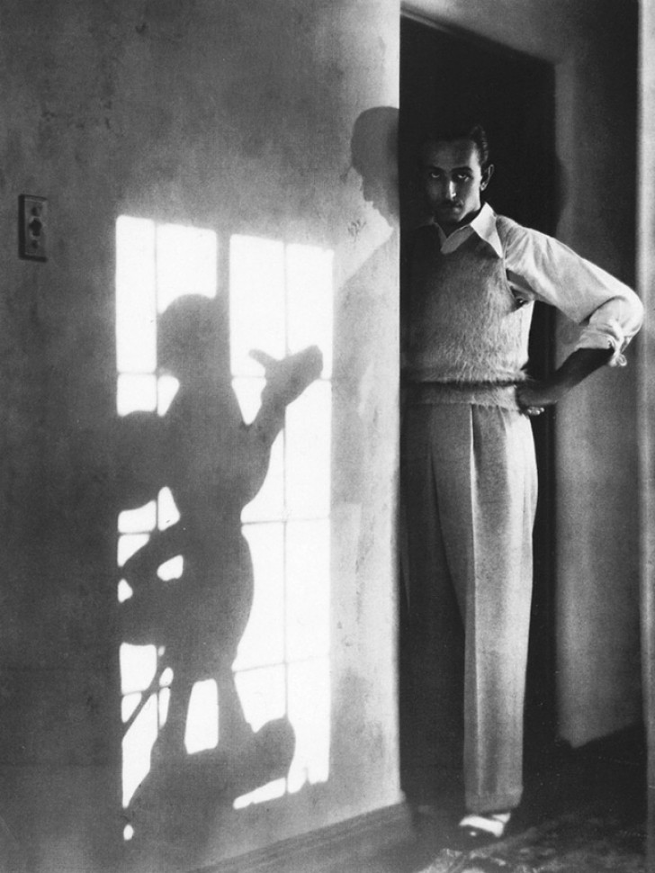 6. Walt Disney and Mickey Mouse playing with lights and shadows in 1939.