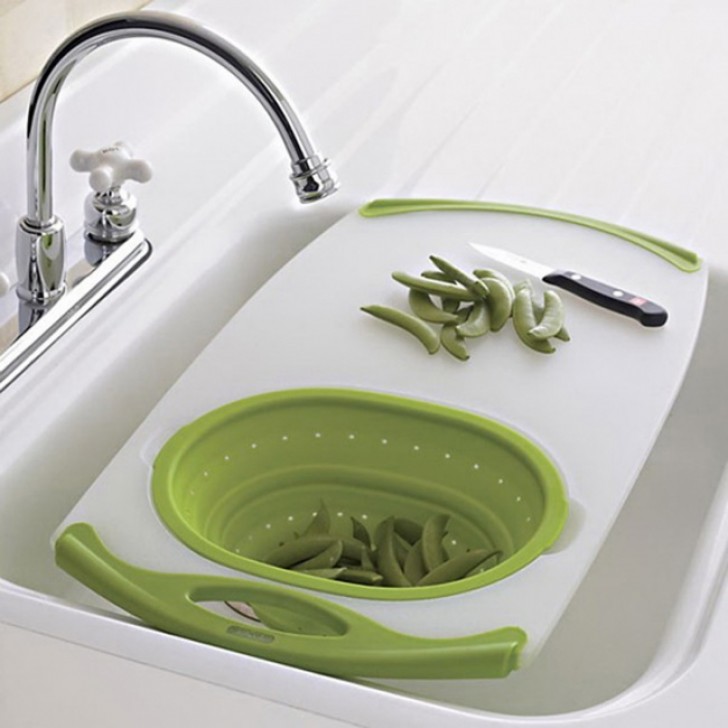 22. An over-the-sink cutting board with a cleaning bowl incorporated.