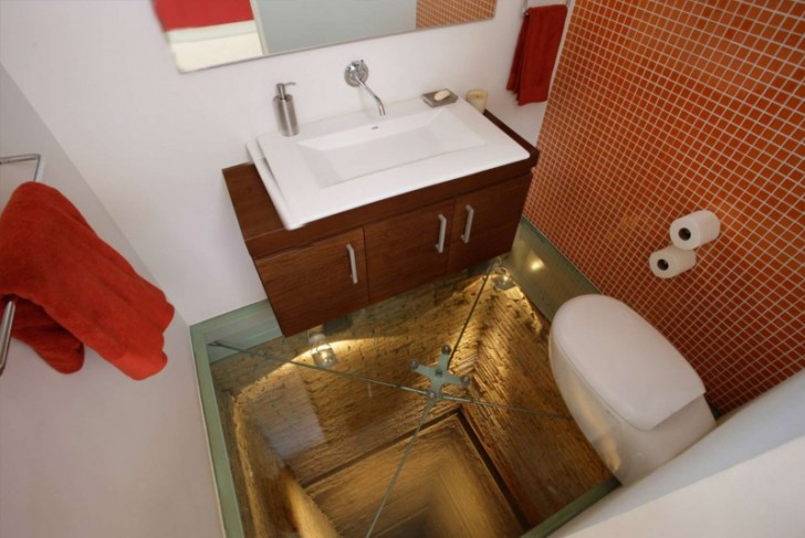 12. A bathroom with a glass floor ... built over a former elevator shaft!