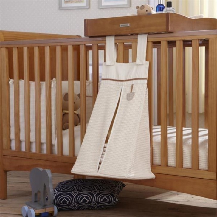 15. A diaper holder that can be hung on a cradle or a cot.