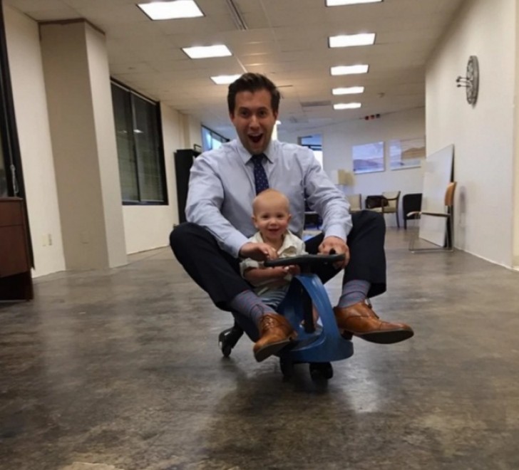 Even in a shirt and tie, a dad always knows how to entertain his little boy!