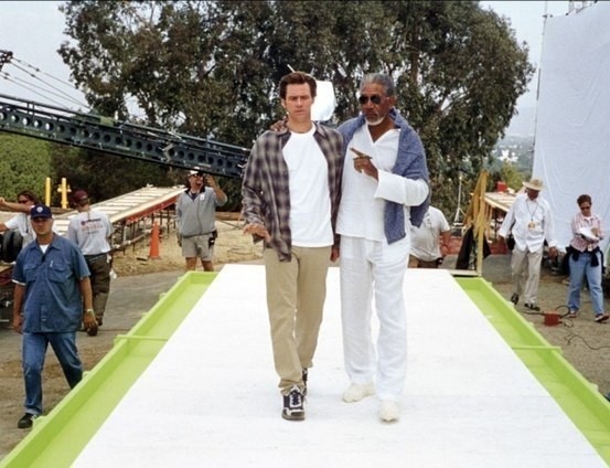 Jim Carrey and Morgan Freeman on the set of the movie "Bruce Almighty" (2003)