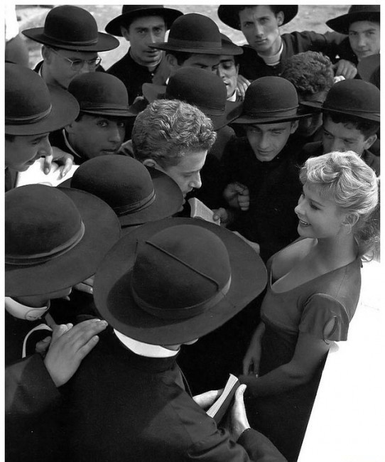 The actress Marisa Allasio with a group of seminarians admirers of her work. (Rome, 1955)