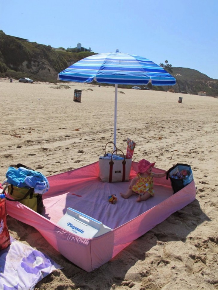 Here is how a sheet with corners spread out on the sand at the beach can be very useful!