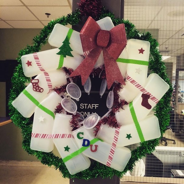 A holiday wreath created with male urinals.