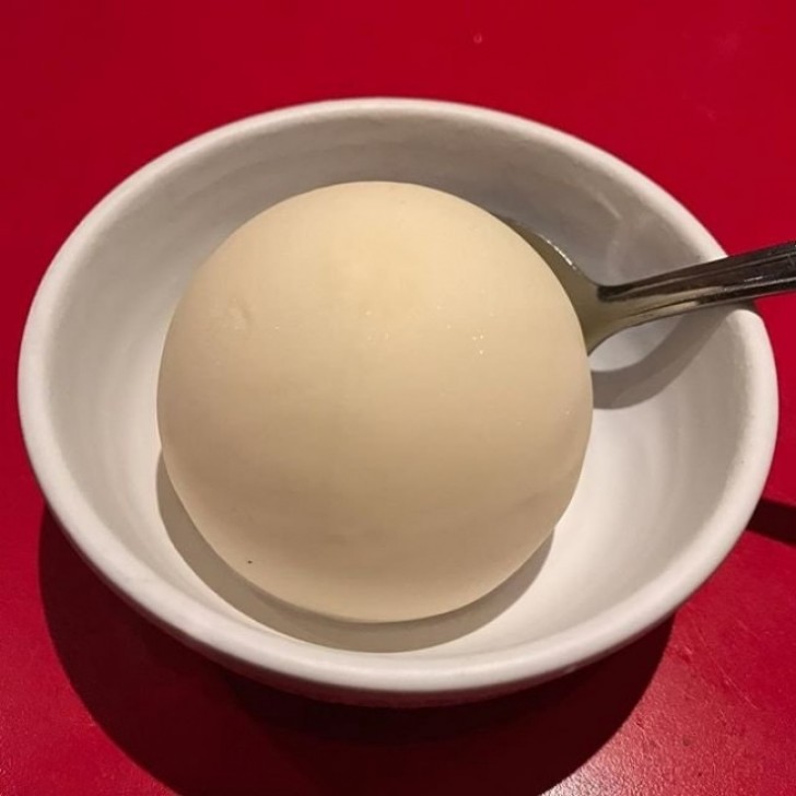 27. A beautiful and perfectly spherical ball of ice cream.