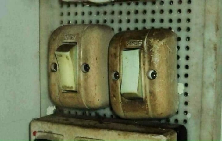 9 - Two light switches with unquestionably guilty "faces".