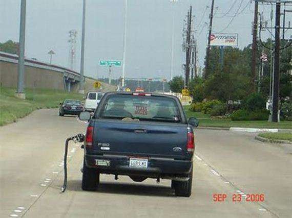 This driver has driven off with the gas pump nozzle still attached to their car ...