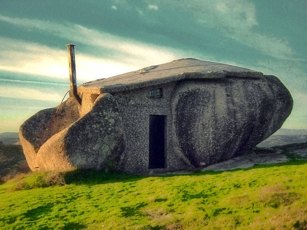 7. Four large boulders transformed into a house