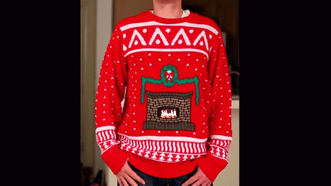 Il maglione di Natale con fiamme del caminetto incorporate!