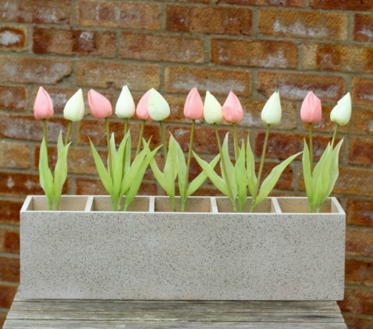 Create a beautiful design vase that looks like rough concrete.