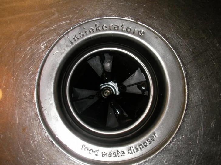 1. Refresh the garbage disposal unit with a simple slice of lemon!