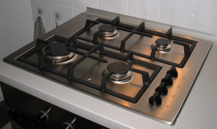Eliminate oil and grease ... by using vegetable oil! With a cloth moistened with vegetable oil, you can easily clean a grease and dirt encrusted stove top.