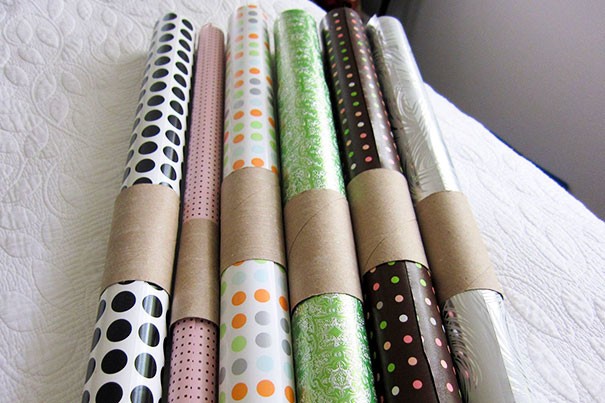 Keep rolls of gift paper in order with the help of toilet paper tubes.