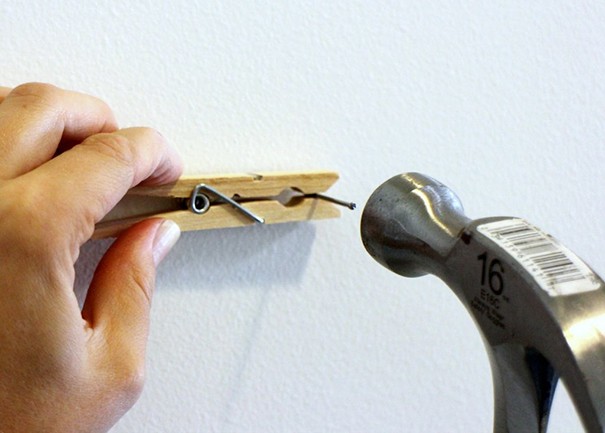 A clothespin can be used to hold a nail on a wall so that you do not hit your fingers!