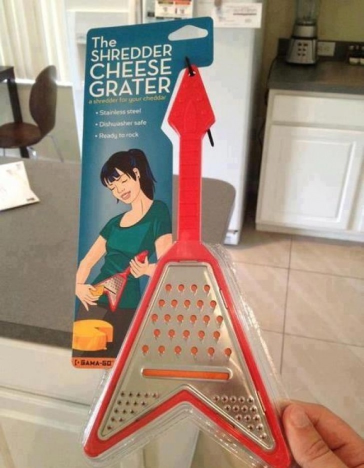 A cheese grater in the shape of an electric guitar so that you can keep on rockin'.