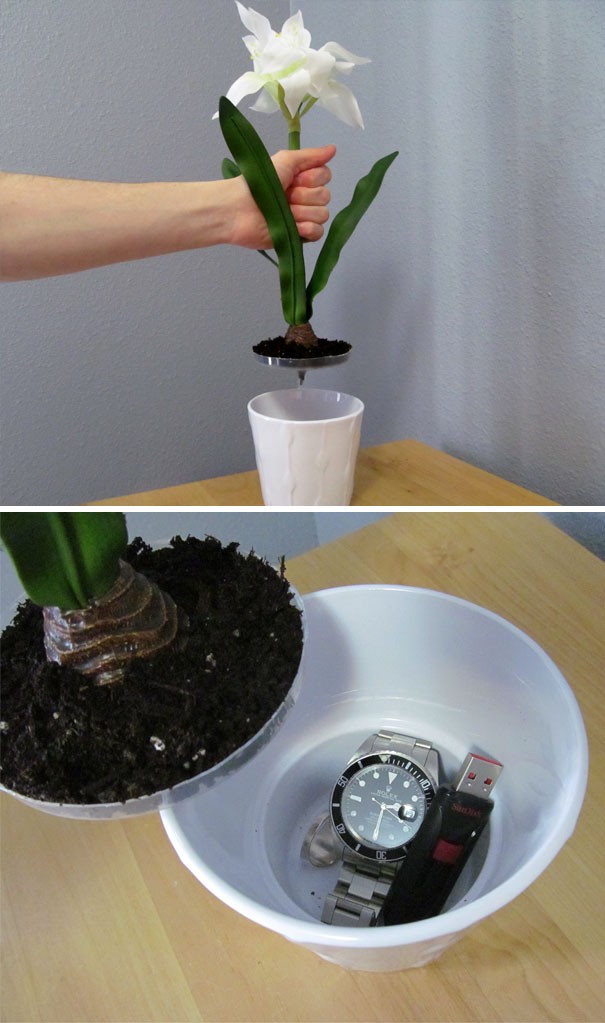15. Use the bottom of a fake flower vase to hide your precious belongings.