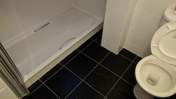 In this hotel, the bathtub is below the floor level, to allow easy entry and exit.