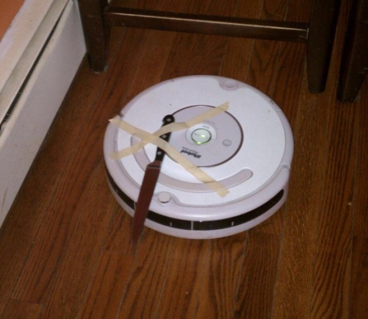 No one will break into your home if you have a security system like this (an armed Roomba robot vacuum cleaner?).