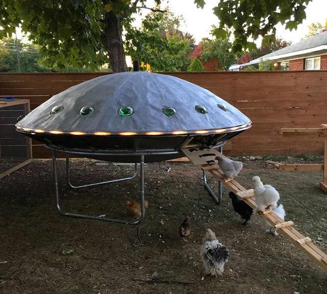 This chicken coop has the shape of a spaceship.