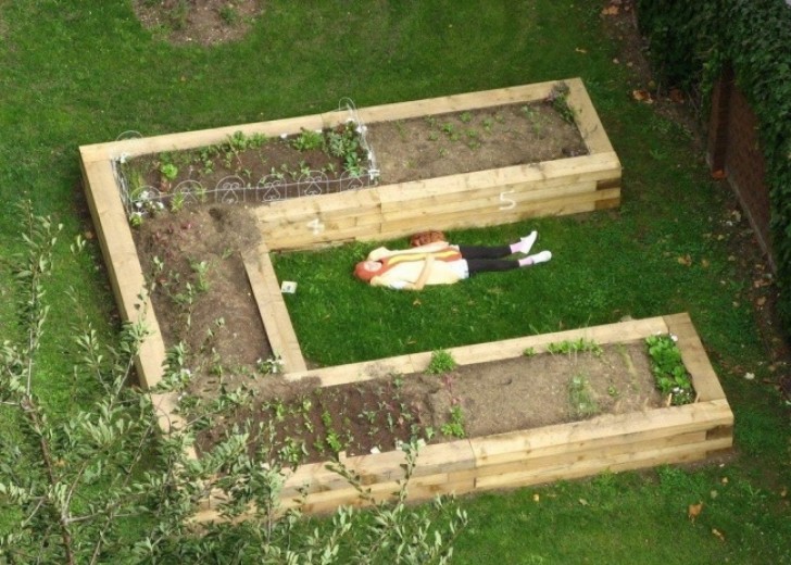 2 - A day like any other --- a man dressed as a hot dog is taking a nap in the garden!