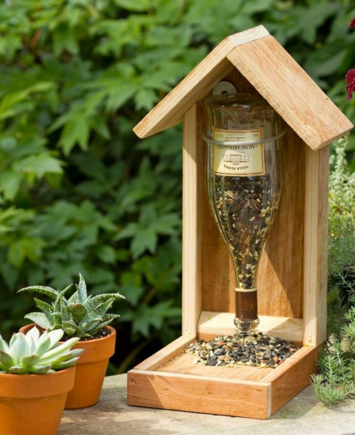 5. A bird feeder (easier with a plastic bottle, but definitely more elegant with a glass bottle!)
