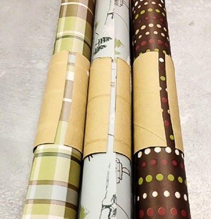 How to keep gift paper from unrolling? With the cardboard from rolls of toilet paper, of course!