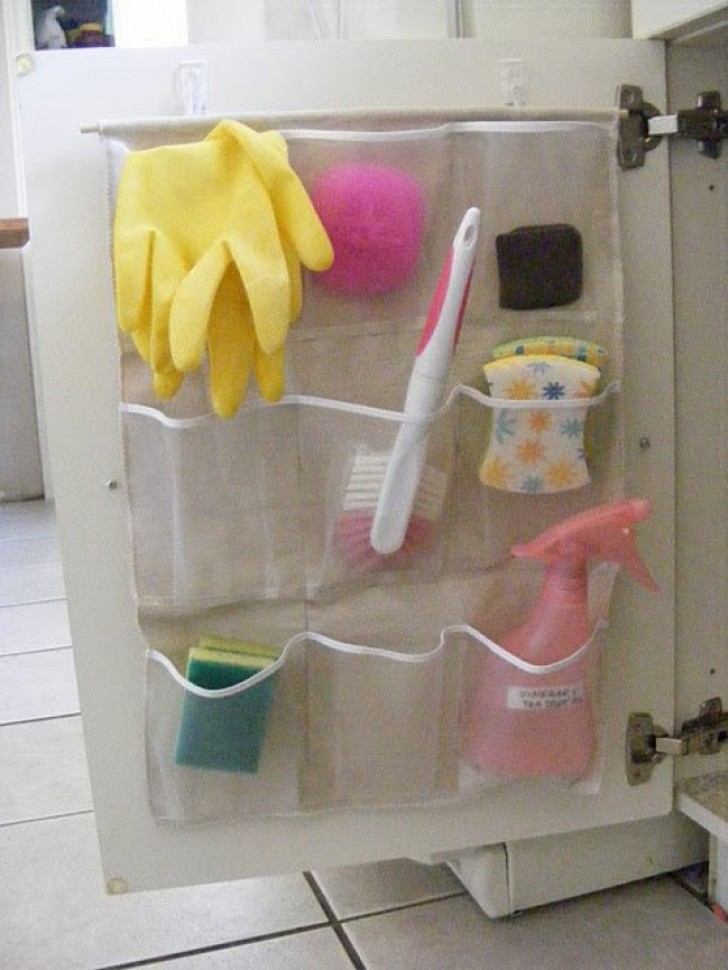 The secret to a clean house is to have everything you need at your fingertips! Take advantage of these comfortable plastic pockets that be attached to the inside of cupboards to store the cleaning tools you use most often.