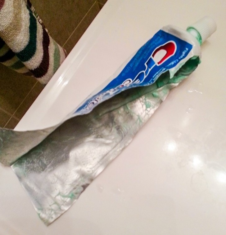 Her boyfriend wanted to throw this tube of toothpaste away, days ago, but she showed him how much product there was still to be consumed!