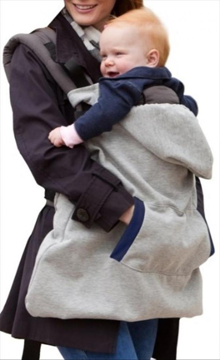 Un sac tres pratique pour porter bébé dans les bras et garder vos mains au chaud.

