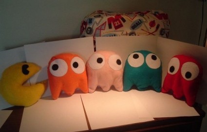 These Packman throw pillows know what is going to happen!
