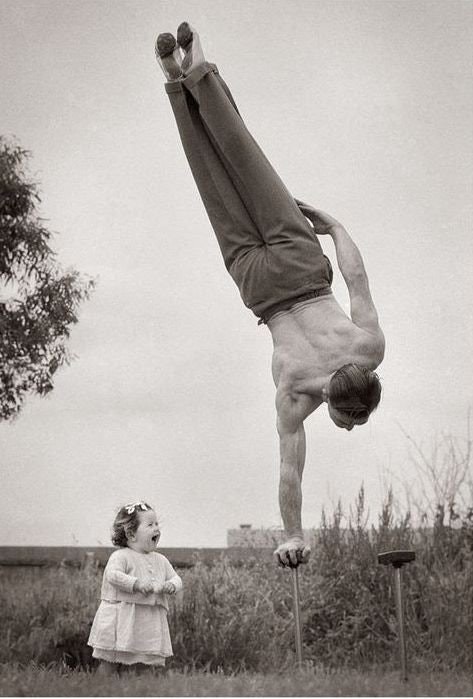 "My grandfather showing his ability to entertain his daughter in 1940."