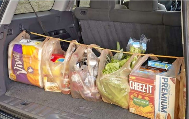 Keep an elastic hook in the car trunk. It will be useful to keep your shopping bags in place!