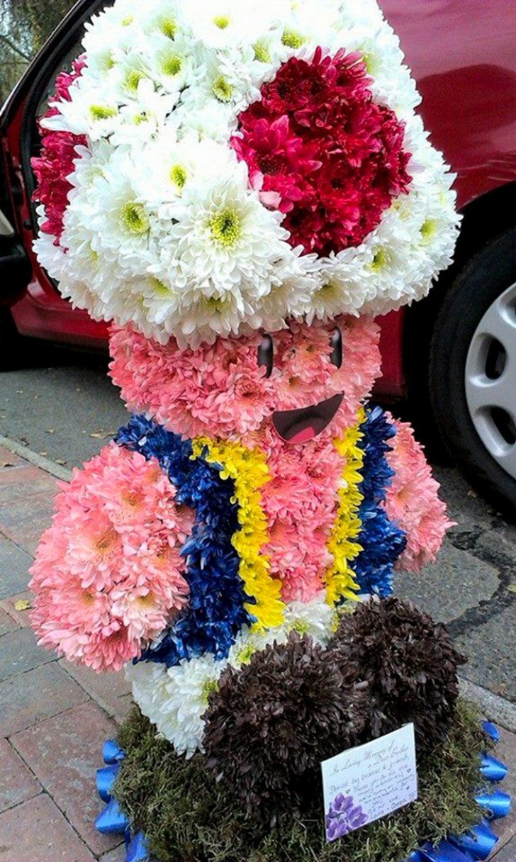 Een bloemenkrans ter ere van de hobby van de overledene.