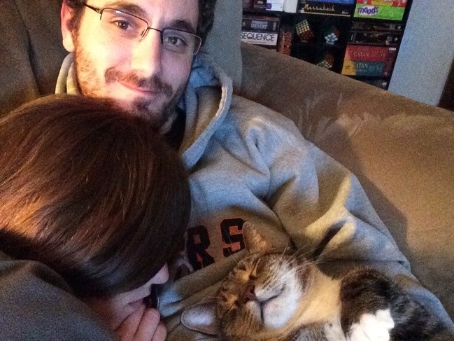 "Our cat and my girlfriend fell asleep on me."