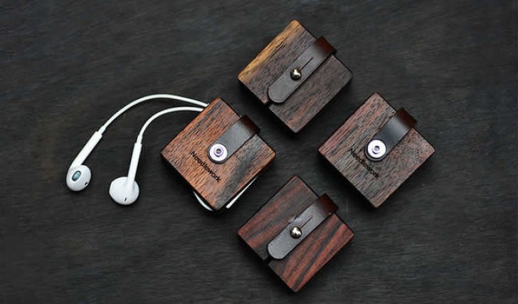 No more tangled earbuds with these wooden holders.