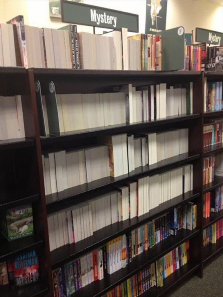 A bit of healthy humor? --- In the "mystery" section all the books are arranged with the titles and the authors' names hidden!