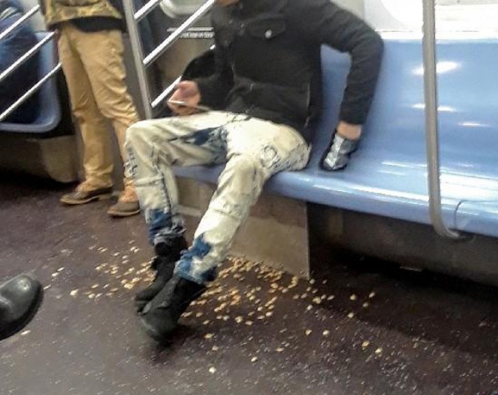 17. This boy is eating pistachios and does not care that he is throwing the shells on the floor