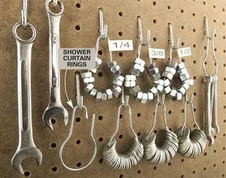 21. And finally, a very aesthetic and cool looking idea for storing wrenches, bolts, and washers ...