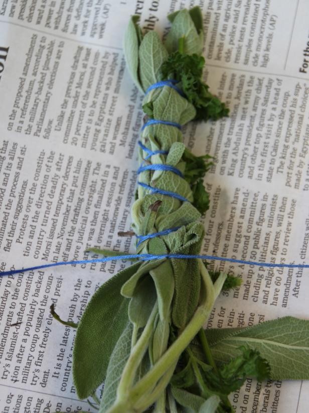 Tie all the herbs together, squeezing moderately when tying the knots.