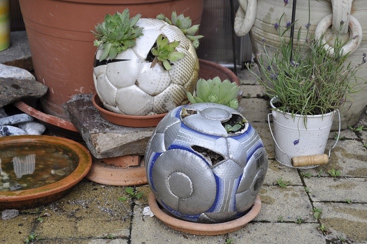 5. Even a ripped or torn soccer ball can turn into something original for the garden.