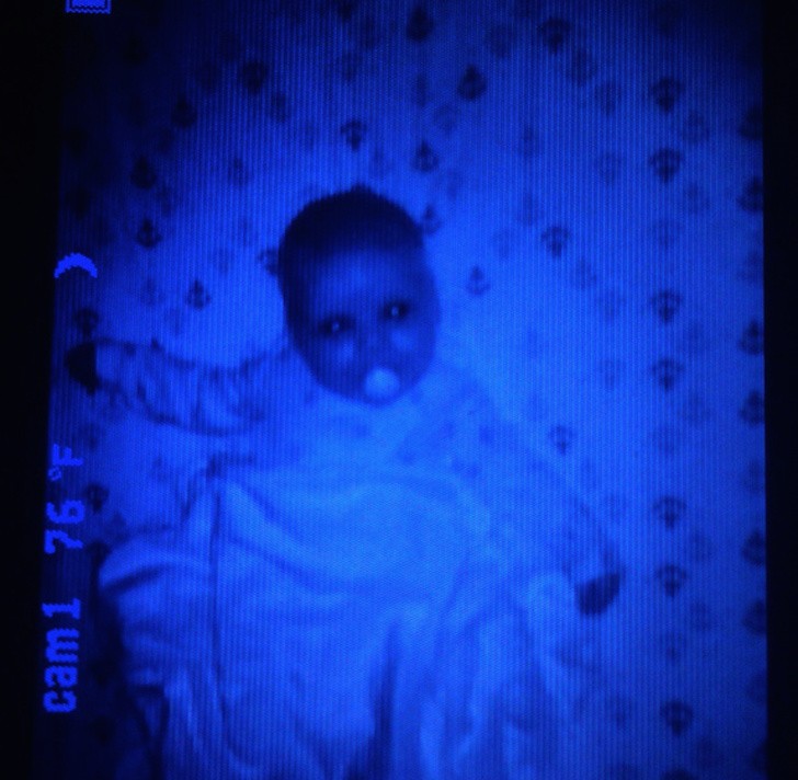  'We live in a 1950s house built on a military base. One night, I heard my two-month-old daughter laugh and when I turned on the camera monitor --- I saw this."