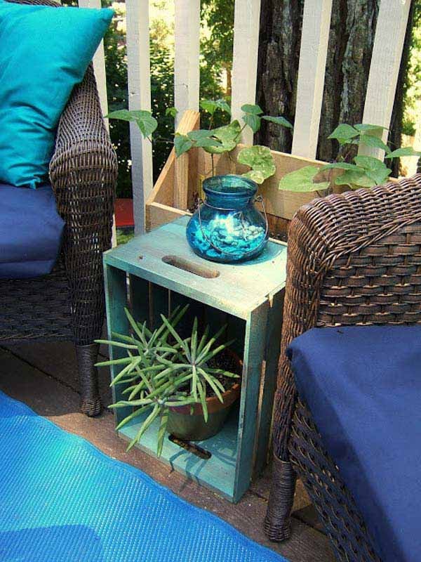 12. A simple wooden fruit crate can be transformed into a very elegant looking table