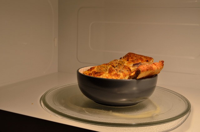 To reheat pizza, and any other similar product, it is better to put it in the microwave with a glass of water, then it will be like it is freshly baked!