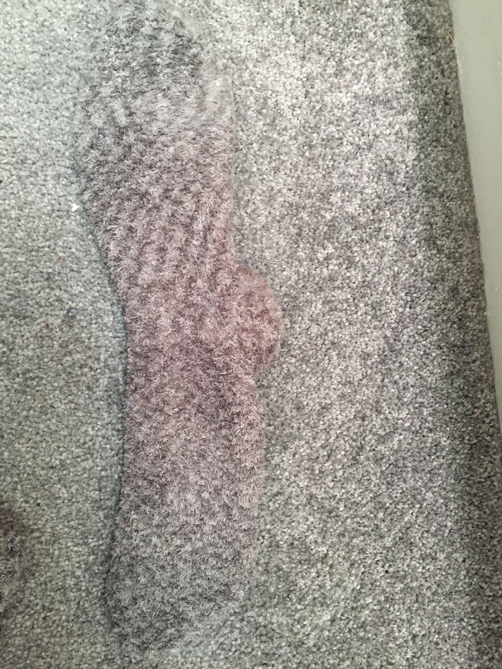 My sock and the bathtub mat --- try to distinguish them!