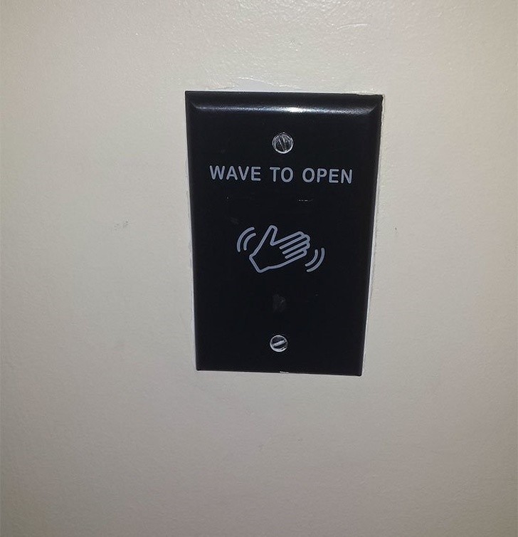 The door to this restroom does not need to be touched to be opened because it is controlled by a photoelectric cell response.