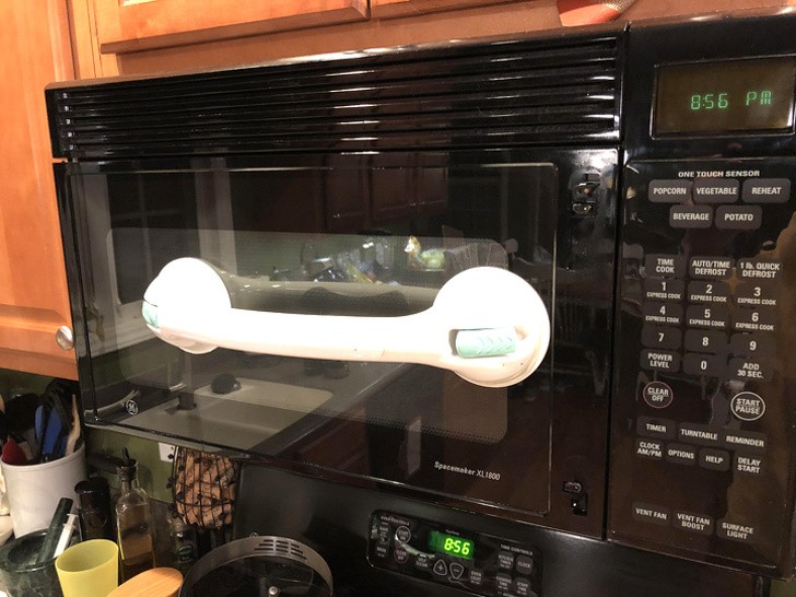 1. A bathroom suction cup handle can replace a broken microwave handle.