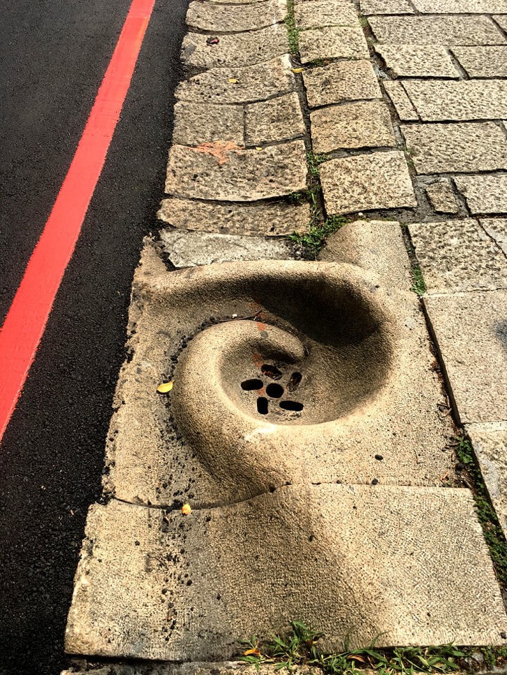Spiral directing drain ... That's cute!