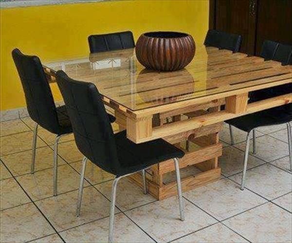 14. More obvious than previous ideas, but not less useful and beautiful --- a wooden pallet table with a glass top.